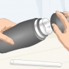 Maak 'n muwwe waterbottel skoon
