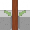 Die plaas van 'n hout heiningpaal