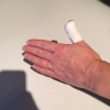Sit 'n verband om jou duim