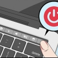 Maak die sleutelbord van 'n macbook pro skoon
