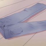 Neem die grootte van jeans