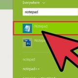 Skep 'n eenvoudige webblad met windows notepad