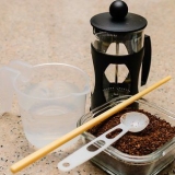 Een espresso maak met 'n kafee
