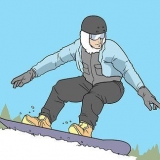 Doen 'n frontside 360 ​​op 'n snowboard