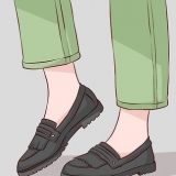 Groen broek aan