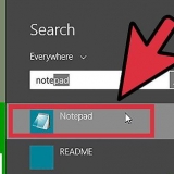 Skep 'n program met notepad