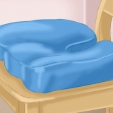 Met behulp van 'n coccyx kussing