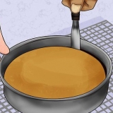 Herstel 'n koek wat gebak is teen die pan