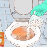 Maak 'n toilet oop met koeksoda