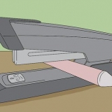 Een vasgelopen niemachine herstellen