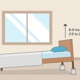 Lig die kop van 'n bed op
