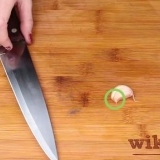 Knoflook kneuzen