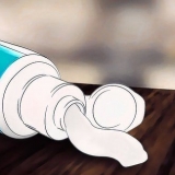 Verwyder skrape van sonbrille