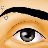 Behandeling van ontsteekte piercings