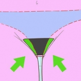 Verwyder skaamhare rondom die vagina