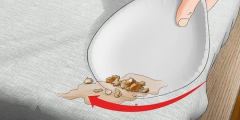 Verwyder braaksel van 'n matras