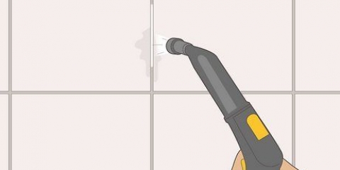 Maak die grout in jou badkamer skoon