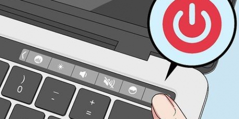 Maak die sleutelbord van 'n macbook pro skoon