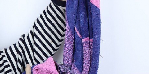 Droog jou hare met 'n handdoek