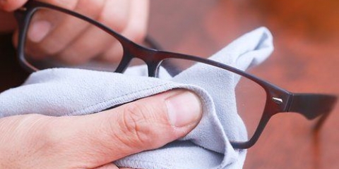 Verwyder skrape van plastieklense
